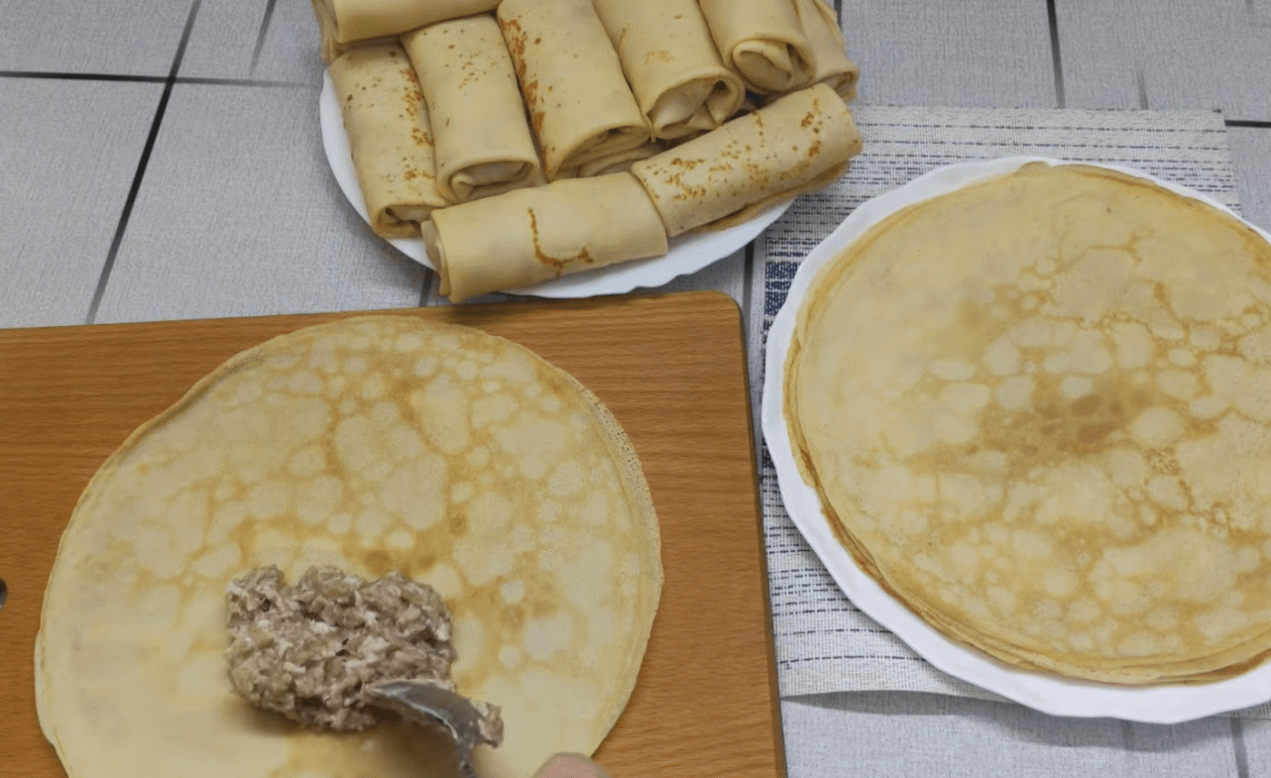 млинці з м'ясною начинкою